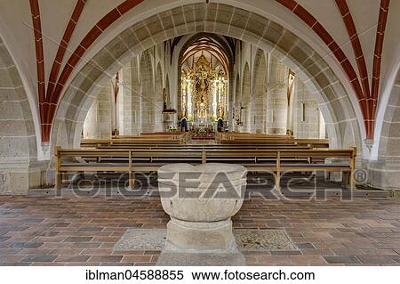 Stock Photography - Romanesque baptismal font, parish church of the Assumption of the Virgin Mary, Chammünster, near Cham, Bavarian Forest, Upper Palatinate, Bavaria, Germany, Europe. Fotosearch