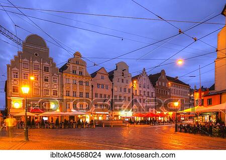 Row of houses, Maximilianstraße with gastronomy at dusk, Old Town, Augsburg, Swabia, Bavaria, Germany, Europe View Large Photo Image Picture - Row of houses, Maximilianstraße with gastronomy at dusk, Old Town, Augsburg, Swabia, Bavaria, Germany, Europe. Fotosearch