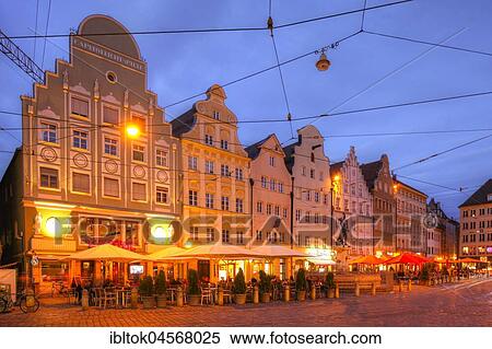 Stock Photography - Row of houses, Maximilianstraße with gastronomy at dusk, Old Town, Augsburg, Swabia, Bavaria, Germany, Europe. Fotosearch