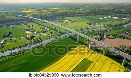 Ruhrtal Bridge, Mintarder bridge over the Ruhr, motorway A52, yellow rape field, Ruhrtal, Mülheim on the Ruhr, Ruhr district, North Rhine-Westphalia, Germany, Europe View Large Photo Image Stock Image - Ruhrtal Bridge, Mintarder bridge over the Ruhr, motorway A52, yellow rape field, Ruhrtal, Mülheim on the Ruhr, Ruhr district, North Rhine-Westphalia, Germany, Europe. Fotosearch