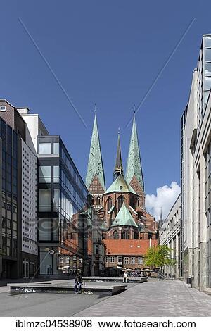 Saint Mary's Royal Church, built between 1277 and 1351, left and right modern department store facades, Lübeck, Schleswig-Holstein, Germany, Europe View Large Photo Image Stock Photo - Saint Mary's Royal Church, built between 1277 and 1351, left and right modern department store facades, Lübeck, Schleswig-Holstein, Germany, Europe. Fotosearch