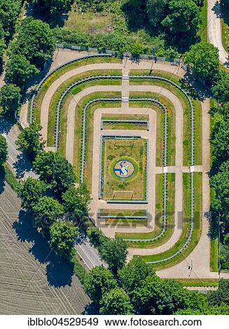 Stock Photo - Schalke cemetery, cemetery Beckhausen-Sutum within sight of the Veltins-Arena, gravesite, Schalker field, Gelsenkirchen, Ruhr district, North Rhine-Westphalia, Germany, Europe. Fotosearch