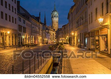 Schlossstraße with tower of the castle church, evening atmosphere, Luther city Wittenberg, Saxony-Anhalt, Germany, Europe View Large Photo Image Stock Photo - Schlossstraße with tower of the castle church, evening atmosphere, Luther city Wittenberg, Saxony-Anhalt, Germany, Europe. Fotosearch