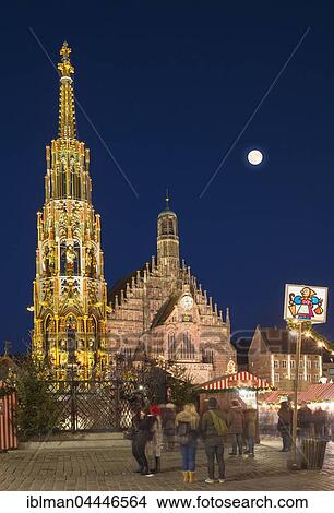 Schöner Brunnen and Church of Our Lady with Nuremberg Christmas Market, full moon, night scene, Nuremberg, Middle Franconia, Franconia, Bavaria, Germany, Europe View Large Photo Image Picture - Schöner Brunnen and Church of Our Lady with Nuremberg Christmas Market, full moon, night scene, Nuremberg, Middle Franconia, Franconia, Bavaria, Germany, Europe. Fotosearch