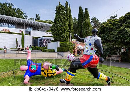 Sculpture The footballers, by Niki de Saint-Phalle, Olympic Museum, Le Musee Olympique, Lausanne, Switzerland, Europe View Large Photo Image Stock Photograph - Sculpture The footballers, by Niki de Saint-Phalle, Olympic Museum, Le Musee Olympique, Lausanne, Switzerland, Europe. Fotosearch