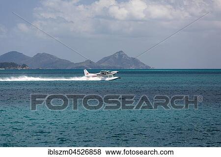 Seaplane in Great Barrier Reef Marine Park, Whitsunday Islands National Park, Whitsunday Islands, Queensland, Australia, Oceania View Large Photo Image Stock Photo - Seaplane in Great Barrier Reef Marine Park, Whitsunday Islands National Park, Whitsunday Islands, Queensland, Australia, Oceania. Fotosearch