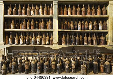 Showroom with old dust covered sherry bottles, winery Bodega Gonzalez Byass, Jerez de la Frontera, Cadiz province, Andalusia, Spain, Europe View Large Photo Image Stock Image - Showroom with old dust covered sherry bottles, winery Bodega Gonzalez Byass, Jerez de la Frontera, Cadiz province, Andalusia, Spain, Europe. Fotosearch