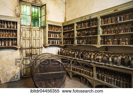 Stock Photography - Showroom with old dust covered sherry bottles, winery Bodega Gonzalez Byass, Jerez de la Frontera, Cadiz province, Andalusia, Spain, Europe. Fotosearch