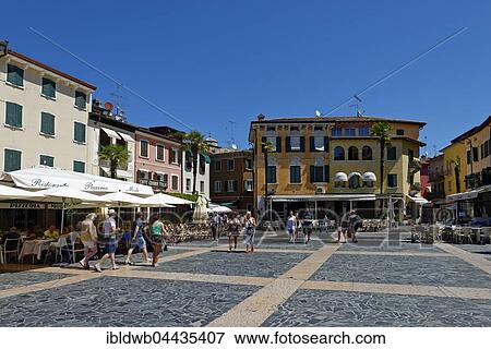 Stock Photo - Sidewalk cafes, Piazza, Sirmione, Lake Garda, Lombardy, Italy, Europe. Fotosearch