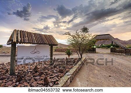 Stock Image - Sign, entrance to the Lodge, The Elegant Desert Lodge, near Sesrim, Namibia, Africa. Fotosearch