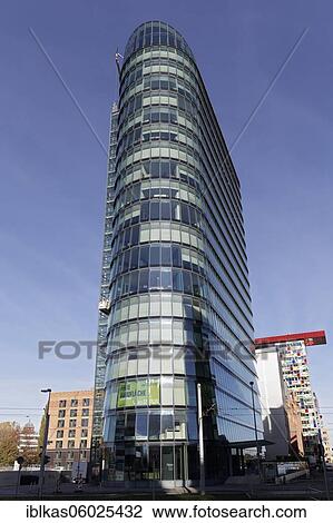Stock Image - SIGN office tower, architects Murphy and Jahn, Media Harbour Düsseldorf, North Rhine-Westphalia, Germany, Europe. Fotosearch