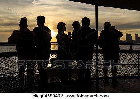 Silhouettes, passengers on the ferry from Toronto to Center Island, Toronto, Ontario, Canada, North America View Large Photo Image Stock Image - Silhouettes, passengers on the ferry from Toronto to Center Island, Toronto, Ontario, Canada, North America. Fotosearch