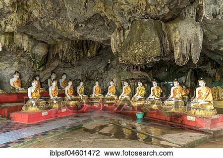 Stock Image - Sitting Buddha statues in the Bayin Nyi Cave Temple, near Hpa-an, Myanmar, Asia. Fotosearch