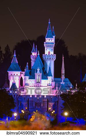Stock Image - Sleeping Beauty Castle by night, Disneyland Park, Disneyland Resort, Anaheim, California, USA, North America. Fotosearch