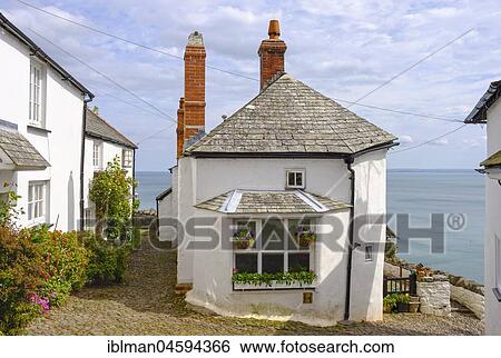 Small house by the sea, Clovelly, Devon, England, Great Britain View Large Photo Image Stock Photograph - Small house by the sea, Clovelly, Devon, England, Great Britain. Fotosearch