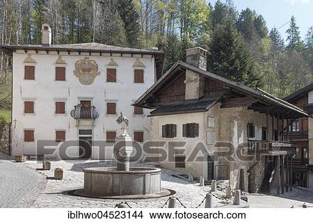 Picture - Small square with fountain, Palazzo Sampieri Vallanzasca Policardi, on the right birthplace of the painter Tizian, Pieve di Cadore, Province of Belluno, Veneto, Italy, Europe. Fotosearch