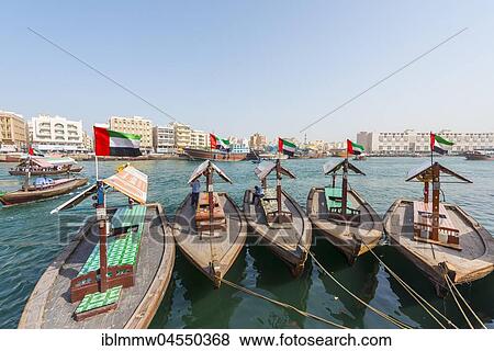 Stock Photo - Small traditional ships on the Creek, Old Dubai, United Arab Emirates, Asia. Fotosearch