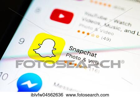 Snapchat app in the Apple App Store, instant messenger service, social web, app icon, display on a screen from mobile phone, iPhone, iOS, smartphone, macro recording, detail, full size View Large Photo Image Stock Photograph - Snapchat app in the Apple App Store, instant messenger service, social web, app icon, display on a screen from mobile phone, iPhone, iOS, smartphone, macro recording, detail, full size. Fotosearch