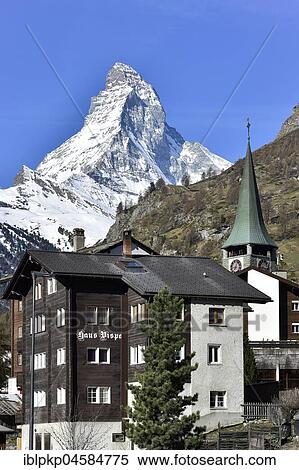 Snow-covered Matterhorn, village with parish church, St. Mauritius, Zermatt, Switzerland, Europe View Large Photo Image Stock Photography - Snow-covered Matterhorn, village with parish church, St. Mauritius, Zermatt, Switzerland, Europe. Fotosearch