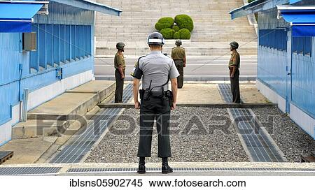 Soldiers standing at the blue barracks in the demilitarized zone, DMZ, border between North Korea and South Korea, Panmunjeom, South Korea, Asia View Large Photo Image Stock Photography - Soldiers standing at the blue barracks in the demilitarized zone, DMZ, border between North Korea and South Korea, Panmunjeom, South Korea, Asia. Fotosearch