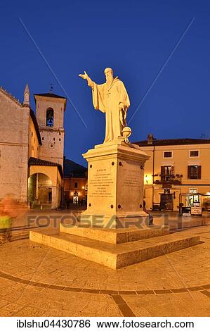 Stock Photograph - Statue of San Benedetto, town square, Norcia, Perugia Province, Umbria, Italy, Europe. Fotosearch