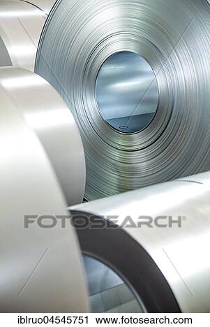 Stock Image - Steal coils, ThyssenKrupp ironworks, Duisburg, Ruhr area, North Rhine-Westphalia, Germany, Europe. Fotosearch