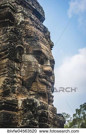 Stock Image - Stone face, Bodhisattva Lokeshvara, Avalokiteshvara, Temple ruin, Bayon Temple, Angkor Thom Complex, Angkor Archaeological Park, Province of Siem Reap, Cambodia, Asia. Fotosearch