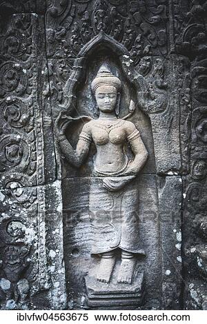 Stone relief of a divine dancer, Apsaras, detail, Preah Khan Temple, Angkor Archaeological Park, province Siem Reap, Cambodia, Asia View Large Photo Image Stock Photography - Stone relief of a divine dancer, Apsaras, detail, Preah Khan Temple, Angkor Archaeological Park, province Siem Reap, Cambodia, Asia. Fotosearch