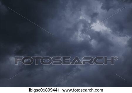Stock Image - Storm with rain clouds, Quebec Province, Canada, North America. Fotosearch