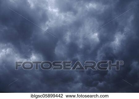 Stock Image - Storm with rain clouds, Quebec Province, Canada, North America. Fotosearch