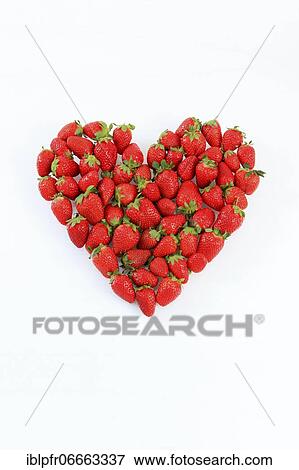 Strawberries in the shape of a heart View Large Photo Image Stock Photo - Strawberries in the shape of a heart. Fotosearch