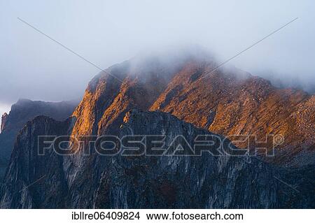 Striking mountains with sunset light, Fjordgard, Senja, Norway, Europe View Large Photo Image Picture - Striking mountains with sunset light, Fjordgard, Senja, Norway, Europe. Fotosearch