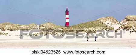 Strollers on the beach, lighthouse, Amrum, North Frisian Islands, Schleswig-Holstein, Germany, Europe View Large Photo Image Stock Photograph - Strollers on the beach, lighthouse, Amrum, North Frisian Islands, Schleswig-Holstein, Germany, Europe. Fotosearch