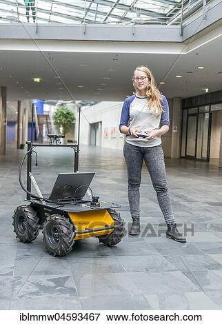 Stock Photo - Student controls a robot car, autonomous driving, University of Applied Sciences Munich, Bavaria, Germany, Europe. Fotosearch