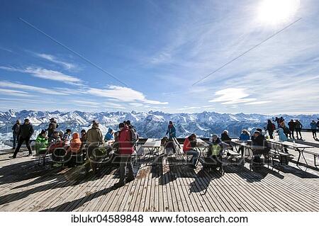 Sun terrace at the Nebelhorn, snow-covered alpine panorama, Kleinwalsertal, Oberstdorf, Vorarlberg, Austria, Europe View Large Photo Image Stock Photo - Sun terrace at the Nebelhorn, snow-covered alpine panorama, Kleinwalsertal, Oberstdorf, Vorarlberg, Austria, Europe. Fotosearch