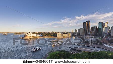 Stock Photo - Sunset, Circular Quay and The Rocks, Skyline with Sydney Opera House, Financial District, Banking District, Sydney, New South Wales, Australia, Oceania. Fotosearch