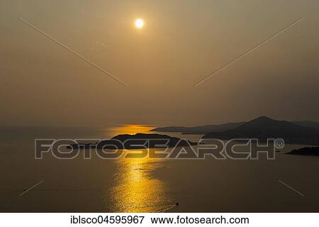Sunset over Sveti Stefan Island, coast near Budva, Monte, Europe View Large Photo Image Stock Photo - Sunset over Sveti Stefan Island, coast near Budva, Monte, Europe. Fotosearch