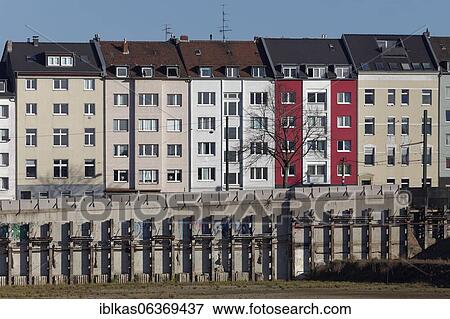 Stock Photo - Supported excavation pit and row of houses, project Stadtquartier Grand Central at Düsseldorf central station, North Rhine-Westphalia, Germany, Europe. Fotosearch