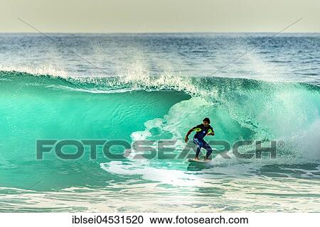 Surfer with large wave, Porto Moniz, Madeira, Portugal, Europe View Large Photo Image Stock Image - Surfer with large wave, Porto Moniz, Madeira, Portugal, Europe. Fotosearch