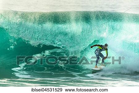 Surfer with large wave, Porto Moniz, Madeira, Portugal, Europe View Large Photo Image Stock Photo - Surfer with large wave, Porto Moniz, Madeira, Portugal, Europe. Fotosearch