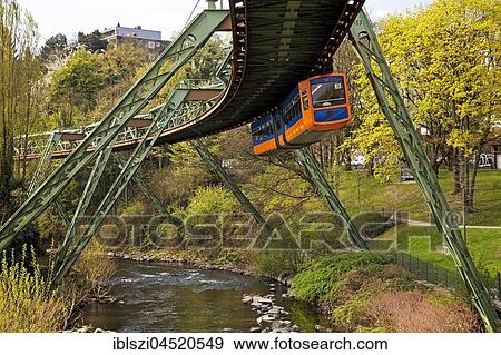Suspension railway above the river Wupper, Wuppertal, Bergisches Land, North Rhine-Westphalia, Germany, Europe View Large Photo Image Stock Photo - Suspension railway above the river Wupper, Wuppertal, Bergisches Land, North Rhine-Westphalia, Germany, Europe. Fotosearch