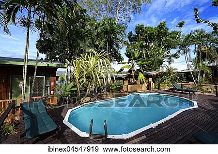 Stock Photo - Swimming pool at the Tufi Dive Resort, Hotel, Tufi, Papua New Guinea, Oceania. Fotosearch