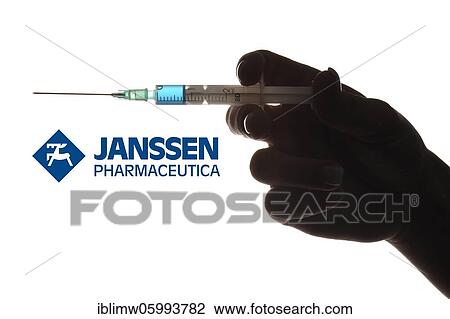 Symbol image Corona vaccine from JANSSEN PHARMACEUTICA, hand with syringe, corona crisis, Baden-Württemberg, Germany, Europe View Large Photo Image Stock Image - Symbol image Corona vaccine from JANSSEN PHARMACEUTICA, hand with syringe, corona crisis, Baden-Württemberg, Germany, Europe. Fotosearch