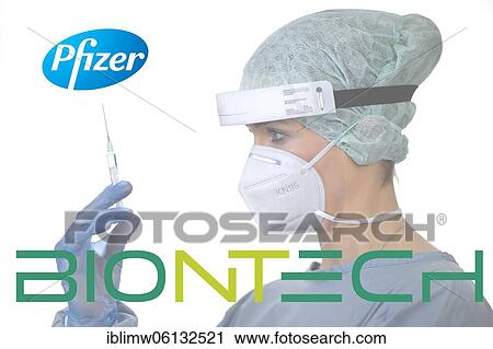 Symbol image Corona vaccine from BIONTECH, PFIZER, woman with syringe, corona crisis, Baden-Württemberg, Germany, Europe View Large Photo Image Stock Image - Symbol image Corona vaccine from BIONTECH, PFIZER, woman with syringe, corona crisis, Baden-Württemberg, Germany, Europe. Fotosearch