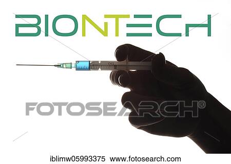 Symbol image Corona vaccine from BIONTECH, hand with syringe, corona crisis, Baden-Württemberg, Germany, Europe View Large Photo Image Stock Photography - Symbol image Corona vaccine from BIONTECH, hand with syringe, corona crisis, Baden-Württemberg, Germany, Europe. Fotosearch