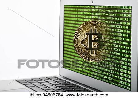 Symbol image cryptocurrency, digital currency, golden physical coin bitcoin laptop with digital binary code View Large Photo Image Picture - Symbol image cryptocurrency, digital currency, golden physical coin bitcoin laptop with digital binary code. Fotosearch