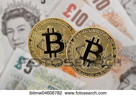 Symbol image cryptocurrency, digital currency, golden physical coin Bitcoin on banknotes British pound sterling View Large Photo Image Stock Image - Symbol image cryptocurrency, digital currency, golden physical coin Bitcoin on banknotes British pound sterling. Fotosearch