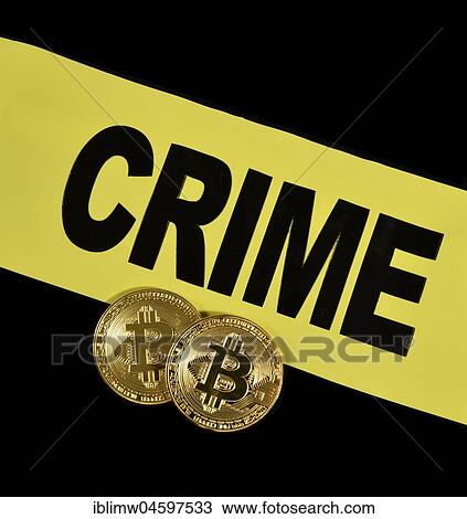 Stock Image - Symbol image digital currency, gold physical coin bitcoin and crime scene barrier. Fotosearch
