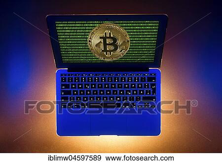 Symbol image digital currency, gold physical coin bitcoin laptop with digital binary code View Large Photo Image Stock Photo - Symbol image digital currency, gold physical coin bitcoin laptop with digital binary code. Fotosearch