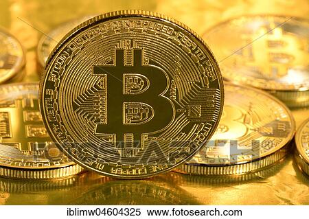 Stock Photography - Symbol image digital currency, golden physical coin Bitcoin. Fotosearch